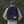 man wearing the Canyon Backpack outside
