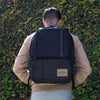 man wearing the Canyon Backpack outside
